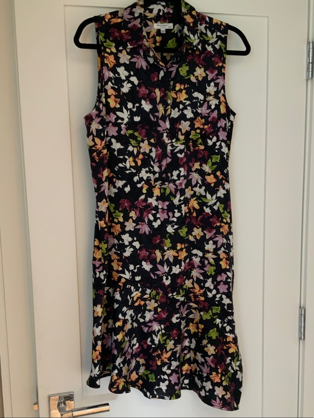 Sleeveless Black Floral Mini Dress with Ruffle Hem
